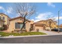 Lovely one-story home offering a two-car garage, manicured lawn, and low-maintenance shrubbery at 4996 Del Pueblo Ave, Las Vegas, NV 89141