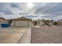 Lovely single-story home featuring a two-car garage and low-maintenance desert landscaping at 1491 Sunrise View Dr, Las Vegas, NV 89110