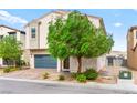 Lovely two-story home with a well-maintained yard and attached garage at 2672 Painted Mist Ct, Las Vegas, NV 89142