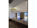 Spacious living room featuring large windows with outdoor views at 3930 University Center Dr # 702, Las Vegas, NV 89119