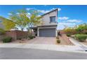 Charming two-story home with drought resistant landscaping and a two car garage at 5981 Smith Valley Rd, Las Vegas, NV 89148