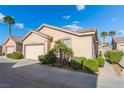 Single-story home with desert landscaping and two car garage at 6622 Black Oil Dr, Las Vegas, NV 89122