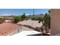 A tranquil view of the neighborhood with desert landscaping and tile roofs at , Henderson, NV 89052