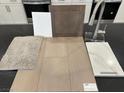 Image displays luxurious kitchen materials: flooring, cabinets, countertop, faucet and rug at 124 Silver Run Ln, Las Vegas, NV 89138