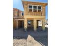 Unfinished new construction showing the framing for this two-story home at 124 Silver Run Ln, Las Vegas, NV 89138
