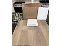Kitchen design sample featuring wood-look flooring, quartz countertop, and stainless steel faucet at 136 Silver Run Ln, Las Vegas, NV 89138