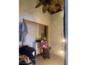 Large closet with hanging rod, shelving, and a ceiling fan at 5065 Celebrity Cir, Las Vegas, NV 89119