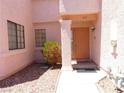 Charming front entrance with a covered porch and inviting front door at number 613 at 613 Cervantes Dr, Henderson, NV 89014