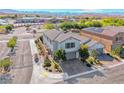 Stunning aerial view of a two-story home showcasing its beautiful surroundings and proximity to community amenities at 10025 San Floriano St, Las Vegas, NV 89178