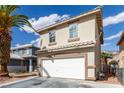Charming two-story home features a two-car garage, tile roof, and side yard access at 1360 Angel Falls St, Las Vegas, NV 89142