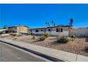 Charming single-story home with desert landscaping at 1631 Ottawa Dr, Las Vegas, NV 89169
