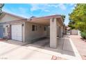 Spacious covered carport provides ample parking and protection from the elements at 25 Colbath St, Las Vegas, NV 89110