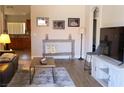 Bright and airy living room featuring stylish decor and seamless flow into the kitchen at 2840 China Cove St, Laughlin, NV 89029
