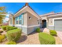Close up of a charming single story home featuring desert landscaping and stone accents at 2910 Monate Ct, Henderson, NV 89044