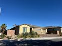 Beautiful single-story home with a three-car garage and well-maintained desert landscaping at 3706 Etendre Ct, Las Vegas, NV 89121