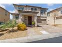 Inviting two-story home featuring a well-manicured yard and covered entryway at 3854 Stadium Ave, Las Vegas, NV 89120