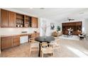 Inviting dining and living area with custom built-ins, neutral paint, and lots of natural light at 7466 Matilda St, Las Vegas, NV 89113