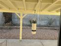 Covered patio and backyard with stone landscaping at , Henderson, NV 89014