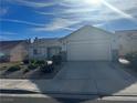 Charming single-story home with a two-car garage and well-maintained landscaping at , Henderson, NV 89014
