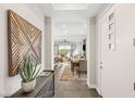Inviting foyer showcasing modern decor and an open layout flowing into the living and dining areas at 11280 Granite Ridge Dr # 1012, Las Vegas, NV 89135