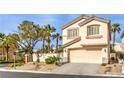 Charming two-story home with a two-car garage and desert landscaping at 170 Wicked Wedge Way, Las Vegas, NV 89148