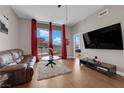Relaxing living room featuring hardwood floors and city views at 200 W Sahara Ave # 603, Las Vegas, NV 89102
