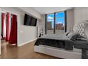 Comfortable bedroom with a view of the city skyline at 200 W Sahara Ave # 603, Las Vegas, NV 89102