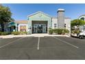 Exterior view of the leasing office and additional parking with a golf cart available at 6955 N Durango Dr # 2081, Las Vegas, NV 89149