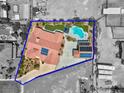 Beautiful desert home boasts an in-ground pool, privacy, and a spacious outdoor living area at 7668 Friendly Breeze Ct, Las Vegas, NV 89123