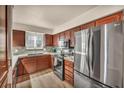 Modern kitchen features stainless steel appliances and granite countertops at 2725 S Nellis Blvd # 2052, Las Vegas, NV 89121