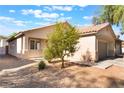 A quaint single story house with low-maintenance desert landscaping with great curb appeal at 2833 Swanson Ave, North Las Vegas, NV 89086