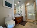 Modern bathroom features a glass shower, floating vanity, and stylish fixtures at 3722 Las Vegas Blvd # 2709, Las Vegas, NV 89158