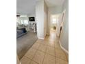 Tiled hallway leading to the main living area and bedrooms at 8340 Winterchase Pl, Las Vegas, NV 89143