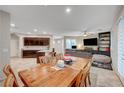 Open concept living space with a dining area and comfortable seating arrangement at 9327 S Chieftain St, Las Vegas, NV 89178