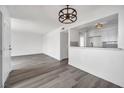 Open-concept floor plan features living room with luxury vinyl plank flooring at 1424 Santa Anita Dr # D, Las Vegas, NV 89119