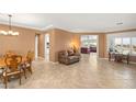 Open-plan living room featuring tile flooring and natural light at 2069 Colvin Run Dr, Henderson, NV 89052