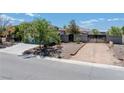 The property featuring RV parking and a fenced in yard at 565 Mazelle Ln, Pahrump, NV 89060