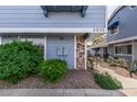 Well-maintained home exterior with visible unit number 5831 and neat landscaping at 5831 Medallion Dr # 103, Las Vegas, NV 89122