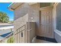 Close up of the unit entrance with stairs, showing door and house number at 8805 Jeffreys St # 2073, Las Vegas, NV 89123