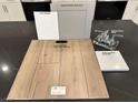 Sample of interior finishes including flooring, cabinets, countertops, and bathroom faucet hardware at 9661 Hinson St, Las Vegas, NV 89139