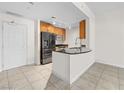 Modern kitchen with stainless steel appliances and granite countertops at 200 W Sahara Ave # 1703, Las Vegas, NV 89102