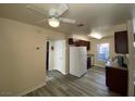 This kitchen offers stainless appliances, ample counter space, wood cabinets, and neutral flooring at 2606 S Durango Dr # 263, Las Vegas, NV 89117