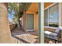 Charming front porch with seating, offering a cozy outdoor welcome to the home at 301 E Van Wagenen St, Henderson, NV 89015
