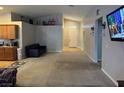 Spacious and bright living room with a neutral color palette and high ceilings at 3928 Ropers Ranch St, North Las Vegas, NV 89032