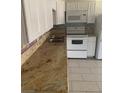 Bright kitchen with granite counters, stainless steel sink, and modern white appliances at 4300 N Lamont St # 249, Las Vegas, NV 89115