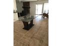 Inviting dining room with ample natural light and stylish furniture arrangement at 4461 Greenhill Dr, Las Vegas, NV 89121