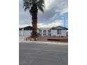 Charming single-story home with a spacious driveway and well-maintained front yard at 4461 Greenhill Dr, Las Vegas, NV 89121