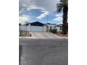 Charming single-story home featuring a spacious driveway and well-maintained landscaping at 4461 Greenhill Dr, Las Vegas, NV 89121