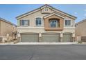 Charming two-story home with a three-car garage and neutral stucco exterior at 4521 Bell Cord Ave # 103, North Las Vegas, NV 89031