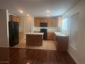 Well-equipped kitchen featuring essential appliances and a functional layout at 523 Cabis Bay St, Las Vegas, NV 89178